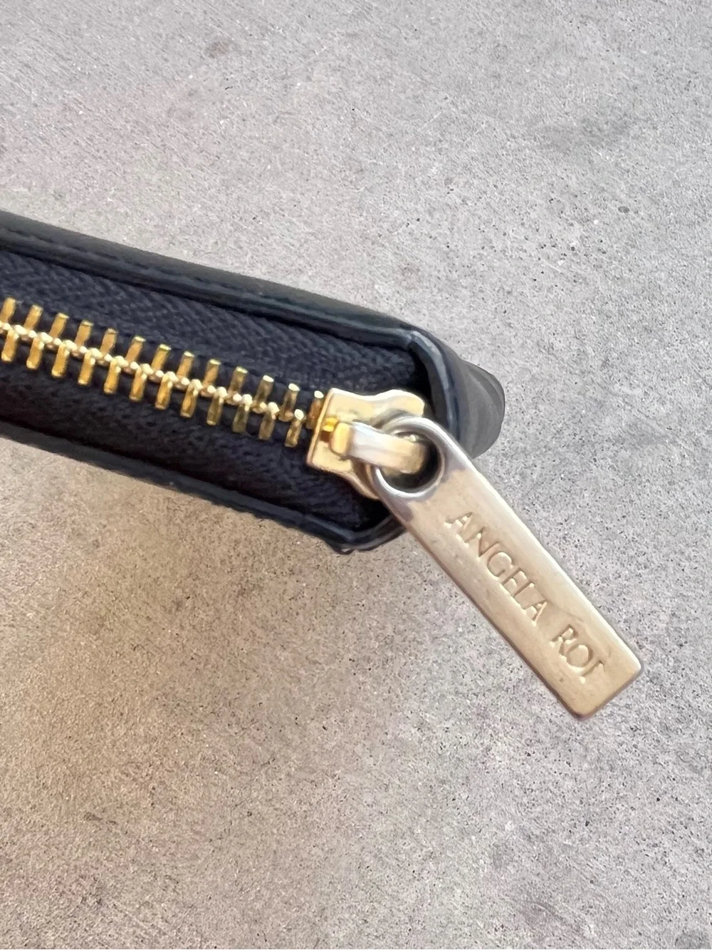Angela Roi black zip wallet